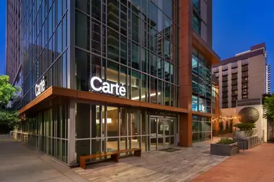 a facade of a building with a sign on it at Carte Hotel San Diego Downtown, Curio Collection By Hilton in San Diego