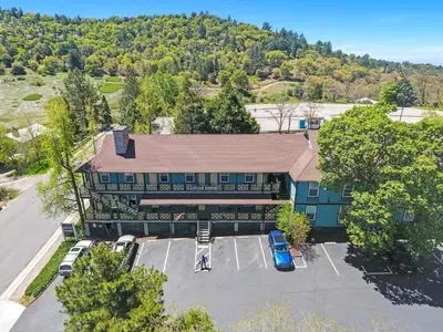 an overhead view of a building with a parking lot at Julian Lodge in Julian