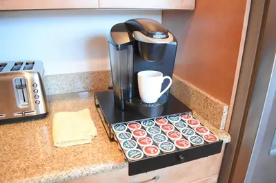 a coffee maker on a counter in a kitchen at Luv Oceanside Views-1 House to Beach, Boardwalk and Waves-Spacious Rooftop Sun Deck-Plus King Beds too! in San Diego