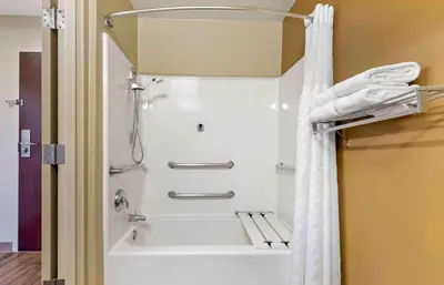 a shower in a bathroom with a white shower curtain at Extended Stay America Suites - Temecula - Wine Country in Temecula