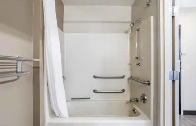a shower in a bathroom with a tub at Extended Stay America Suites - San Diego - Mission Valley - Stadium in San Diego