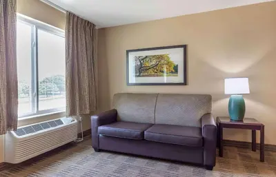 a living room with a couch and a window at Extended Stay America Suites - San Diego - Fashion Valley in San Diego