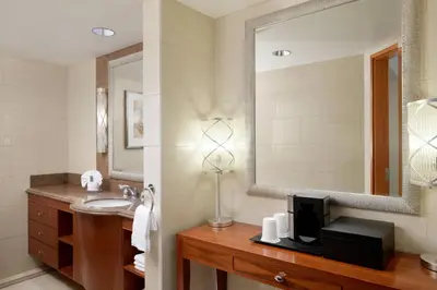 a bathroom with a sink and a mirror at San Diego Marriott Gaslamp Quarter in San Diego