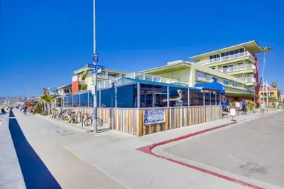 a building on the side of a city street at Surfer Beach Hotel in San Diego