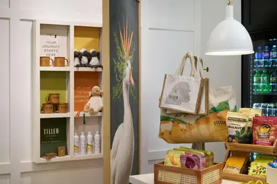 a store with a shelf with bags and other products at Tiller House, Laguna Hills, a Tribute Portfolio Hotel in Laguna Hills