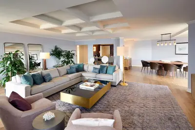 a living room with a couch and a table at Loews Coronado Bay Resort in San Diego