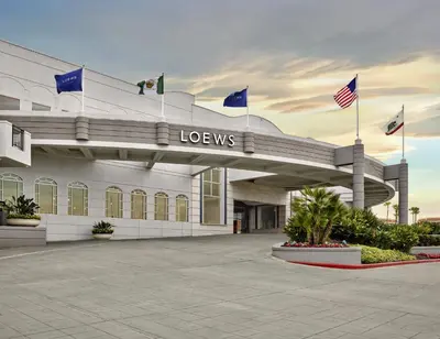a building with american flags in front of it at Loews Coronado Bay Resort in San Diego
