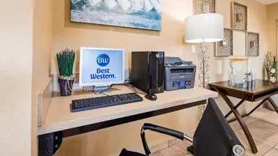 a desk with a computer and a printer at Best Western Poway/San Diego Hotel in Poway