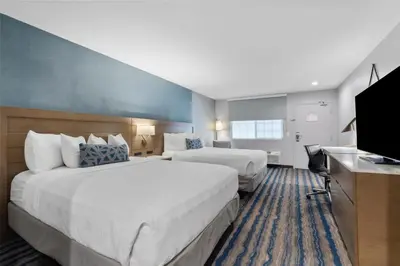 a hotel room with two beds and a television at Best Western San Diego/Miramar Hotel in Miramar