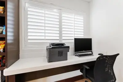 a computer sitting on a desk with a window at Best Western San Diego/Miramar Hotel in Miramar