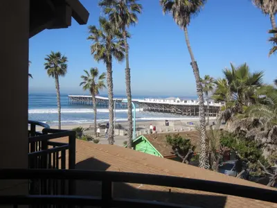 a view of the beach from the balcony of a condo at Ocean Park Inn in San Diego