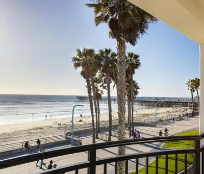 a view of the beach from the balcony of a condo at Ocean Park Inn in San Diego