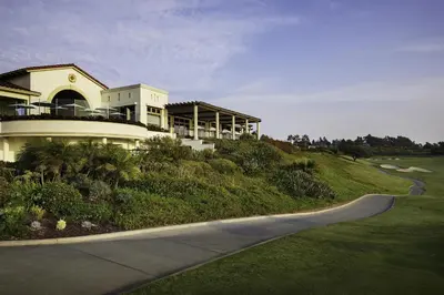 a house on the side of a hill with a road at Waldorf Astoria Monarch Beach Resort & Club in Dana Point