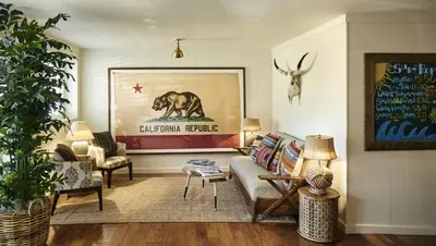 a living room with a couch and a table at Laguna Beach House in Laguna Beach