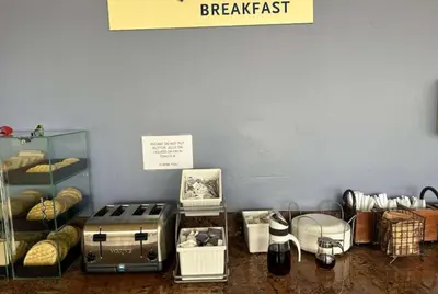a counter with a bunch of items in a room at Days Inn by Wyndham San Diego-East/El Cajon in El Cajon