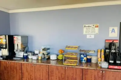 a counter top with food on top of it at Days Inn by Wyndham San Diego-East/El Cajon in El Cajon