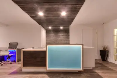 an office with a blank sign in the middle of a room at Oceanside Marina Suites - A Waterfront Hotel in Oceanside