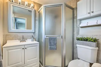 a bathroom with a shower and a toilet and a sink at Chic Central San Diego House with Private Pool! in San Diego
