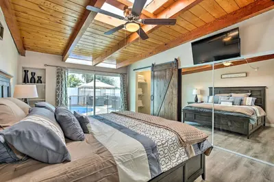 a bedroom with two beds and a ceiling fan at Chic Central San Diego House with Private Pool! in San Diego