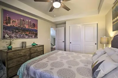 a bedroom with a bed and a ceiling fan at Sunny San Diego Escape Less Than 2 Miles to Pacific Beach! in San Diego