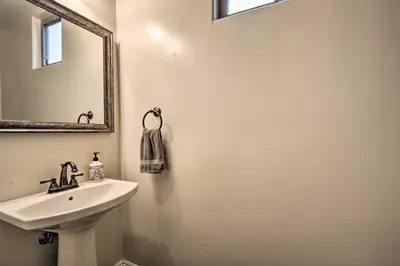 a bathroom with a sink and a mirror at Sunny San Diego Escape Less Than 2 Miles to Pacific Beach! in San Diego