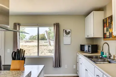 a kitchen with a sink and a window at Escondido Vineyard Estate Walk to Wineries! in Escondido