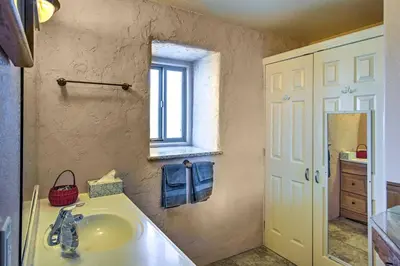 a bathroom with a sink and a window at Borrego Springs Home with Desert and Mountain Views! in Borrego Springs