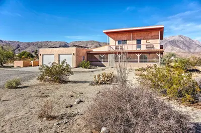 a house in the desert with mountains in the background at Borrego Springs Home with Desert and Mountain Views! in Borrego Springs
