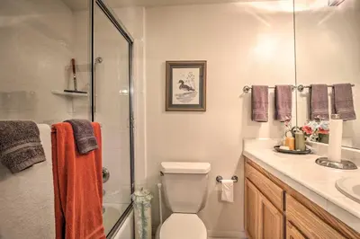 a bathroom with a shower and a toilet and a sink at El Cajon Home with Pool, Grill Station and Decks in El Cajon
