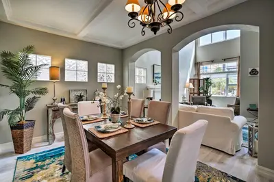 a dining room with a table and chairs at Oceanside Home with Rooftop Patio, Walk to Beach! in Oceanside