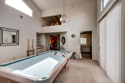 a large room with a pool table in it at Borrego Springs Hideaway Pool Table, Mtn Views! in Borrego Springs