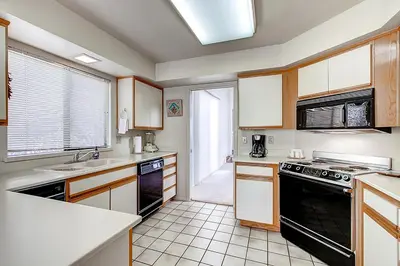 a kitchen with a sink and a stove at Borrego Springs Hideaway Pool Table, Mtn Views! in Borrego Springs