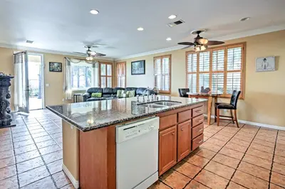 a kitchen with a counter top and a living room at Ocean-View San Diego Home with Pool, Patio and Hot Tub in San Diego