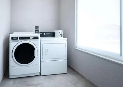 a washer and dryer in a room with a window at Hampton Inn & Suites El Cajon San Diego in El Cajon