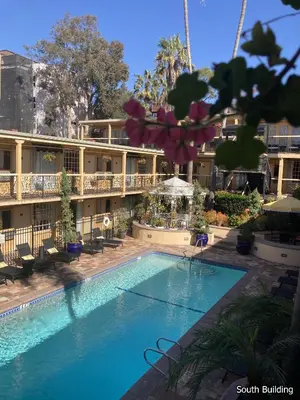 a swimming pool in front of a hotel at 14 West Laguna Beach in Laguna Beach