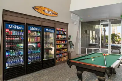 a store with a pool table and soda machines at Worldmark Oceanside Harbor in Oceanside
