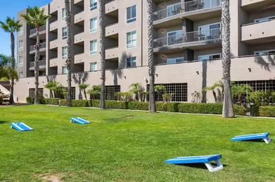 four frisbees on the grass in front of a building at Worldmark Oceanside Harbor in Oceanside