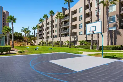a basketball court in front of a building at Worldmark Oceanside Harbor in Oceanside