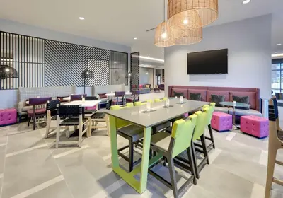 a dining room with a table and chairs at Homewood Suites By Hilton Irvine Spectrum Lake Forest in Lake Forest