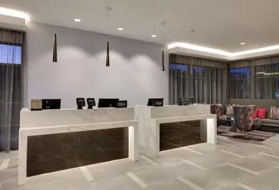 a lobby with a marble counter in a room at Hampton Inn by Hilton Irvine Spectrum Lake Forest in Lake Forest