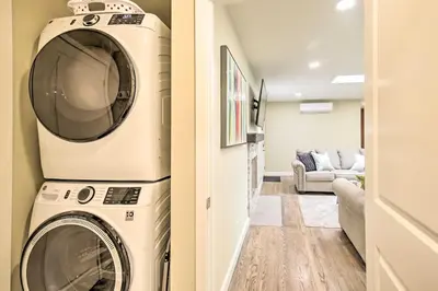 a washer and dryer in a living room at Coastal Carlsbad Home 1 Mi to Beach and Downtown in Carlsbad
