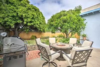 a patio with a table and chairs and a grill at Coastal Carlsbad Home 1 Mi to Beach and Downtown in Carlsbad