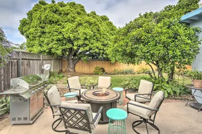 a patio with chairs and a table and a grill at Coastal Carlsbad Home 1 Mi to Beach and Downtown in Carlsbad
