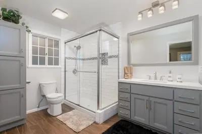 a bathroom with a shower and a toilet and a sink at The Heart of Julian in Julian