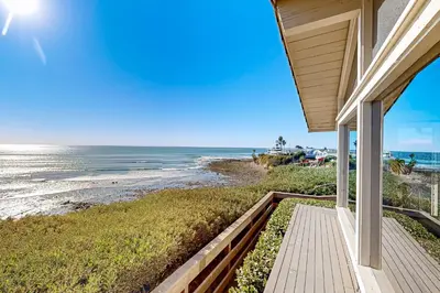 a view of the beach from the porch of a house at Forever Views in San Diego