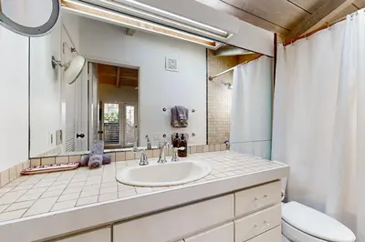 a bathroom with a sink and a toilet at Forever Views in San Diego