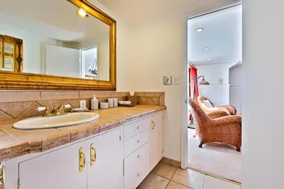 a bathroom with a sink and a mirror at Casa Dolce in San Diego
