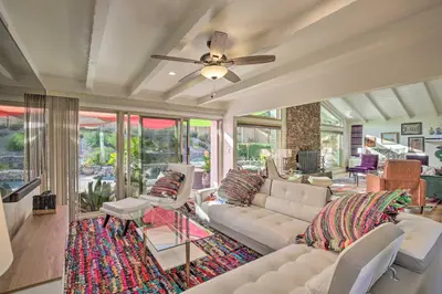 a living room with couches and a ceiling fan at Luxe El Cajon Oasis with Pool, Fire Pit and Pavilion in El Cajon