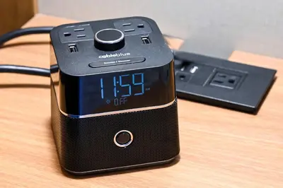 a alarm clock sitting on top of a wooden table at Fairfield Inn & Suites by Marriott Menifee in Menifee