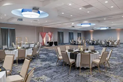 a banquet room with tables and chairs in a room at Fairfield Inn & Suites by Marriott Menifee in Menifee
